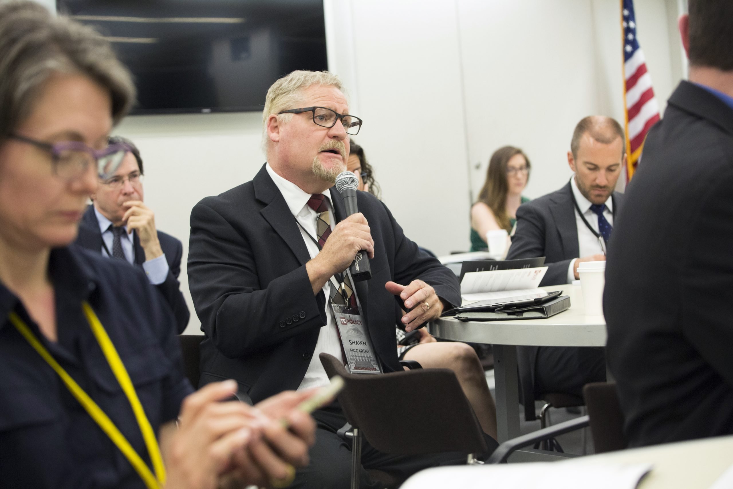 An attendee asks a question at the "How Tech Is Making Government Work Better" session at Techonomy Policy 2015. (Photo by Rebecca Greenfield)